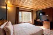 Bedroom with work desk and wardrobe
