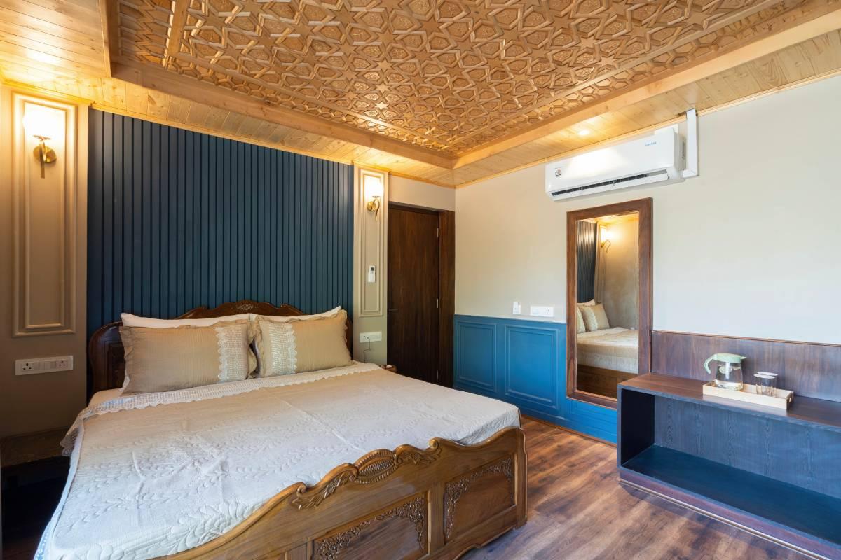Super Deluxe bedroom with blue accents at Khwab Villa | Kangan, Kashmir Super Deluxe bedroom with blue accents at Khwab Villa